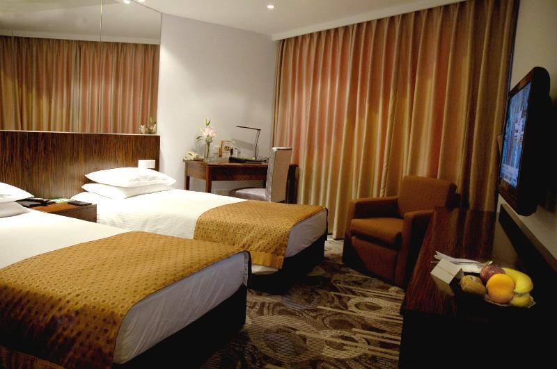 City Hotel Sanghaj Szoba fotó