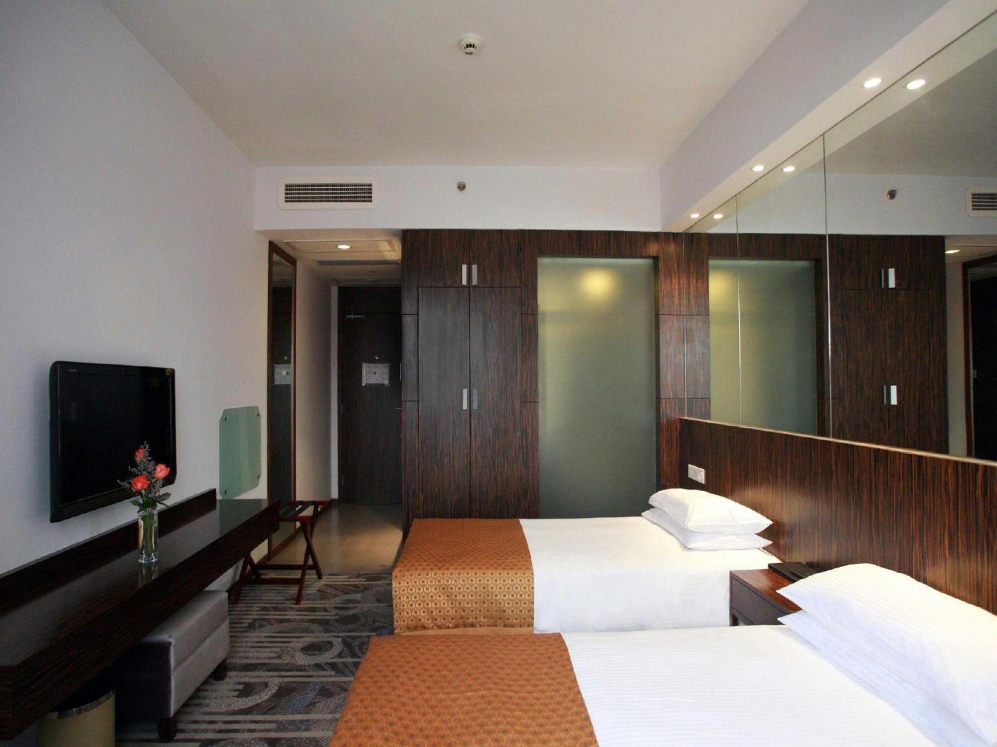 City Hotel Sanghaj Szoba fotó